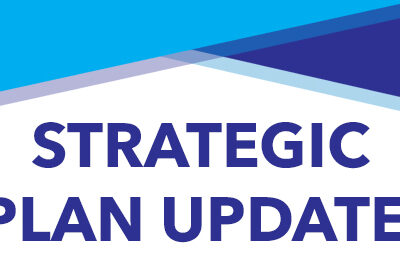 Bold text reads "STRATEGIC PLAN UPDATE" against a colorful geometric background, indicating a focus on organizational progress.